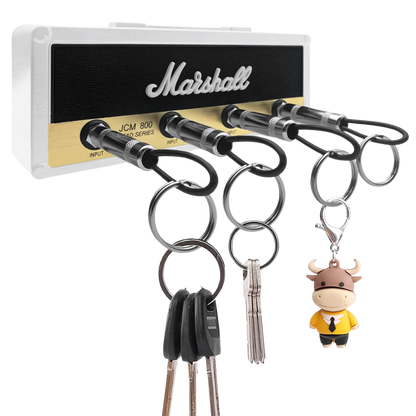 Key Holder inspired in the amplifier JCM 800 in Black and Brass color with logo of the brand in the midle